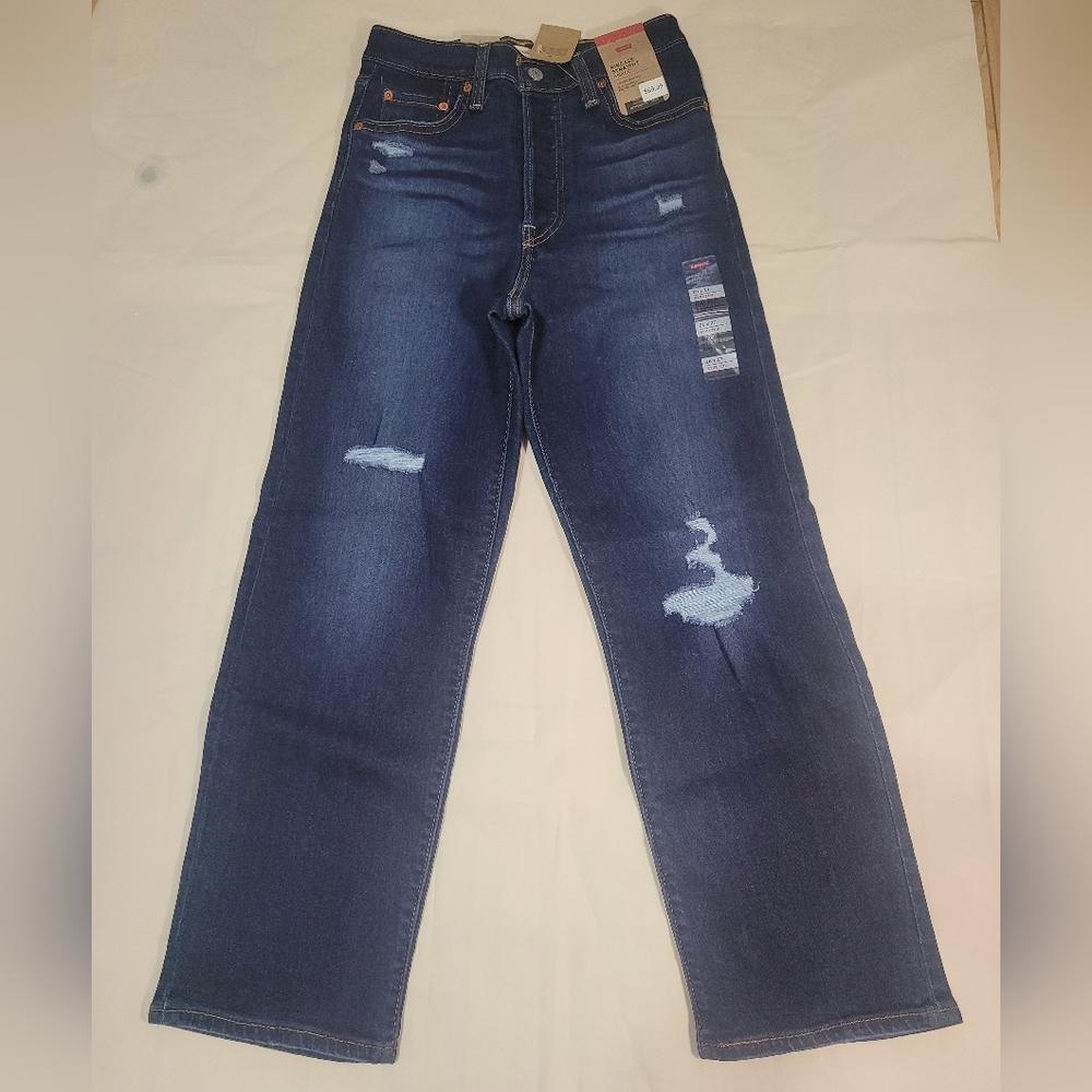 Levi's women's ribcage straight leg jeans destructed blue color size 24X27.